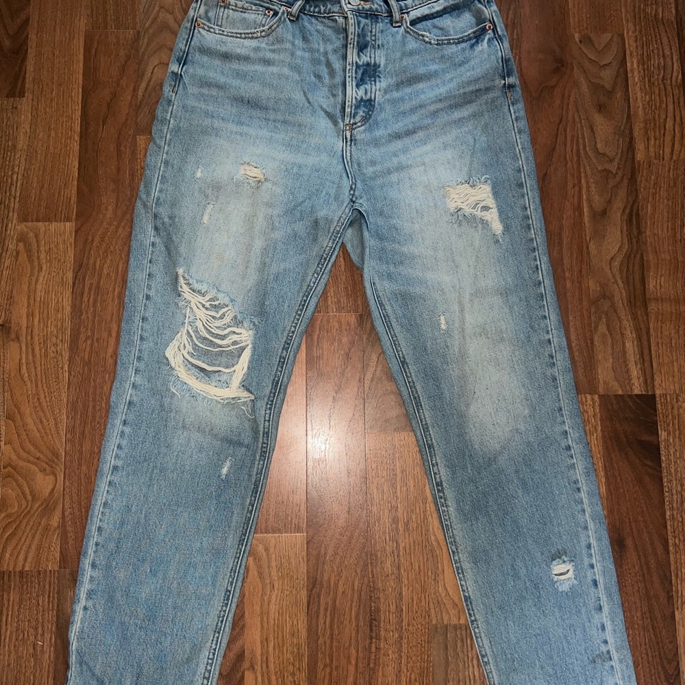 High rise, slim straight leg, distressed BDG denim jeans from Urban Outfitters.
